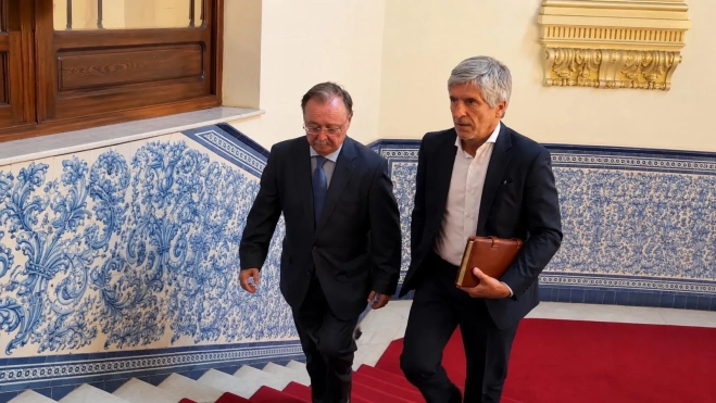 The Minister of the Interior, Fernando Grande-Marlaska (right), meets with the president of the autonomous city of Ceuta, Juan José Vivas (left), at the Government Delegation. Gabriela Sardá Núñez / Europa Press