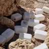 Garrafas de combustible abandonadas. Europa Press TV