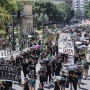 Varias personas durante una manifestación por la huelga indefinida de la enseñanza pública no universitaria. Rober Solsona / Europa Press
